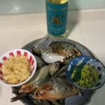Mud crabs in garlic and white wine sauce prepped for cooking