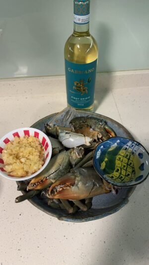 Mud crabs in garlic and white wine sauce prepped for cooking