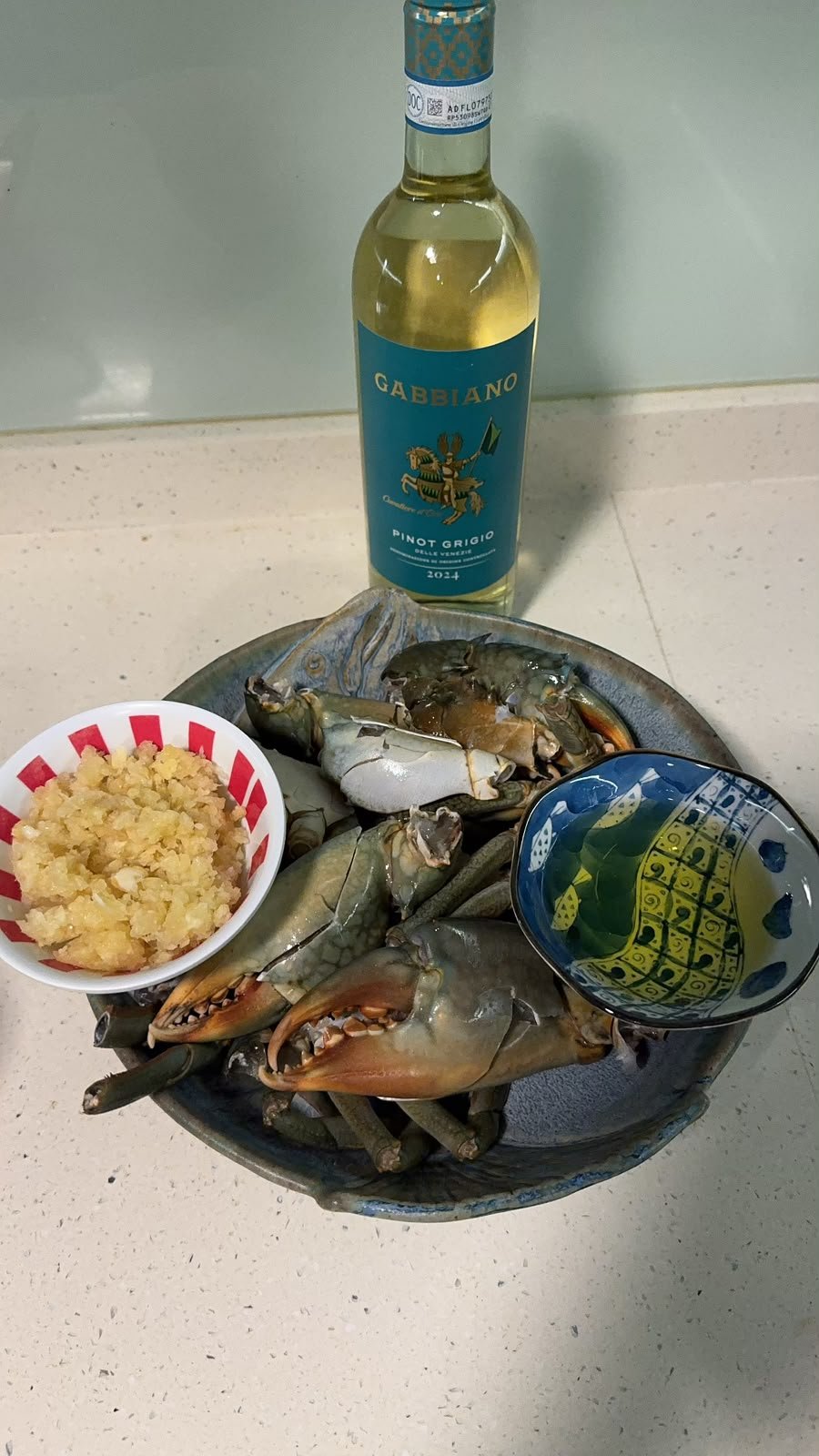 Mud crabs in garlic and white wine sauce prepped for cooking