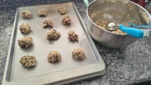 portioned cookie dough on baking pans